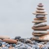 Demos e capitalismo, logiche divergenti Stones Cairn Balance Stone Pile Stone Tower Zen