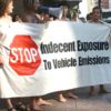 Banner_protesting_vehicle_emissions_at_the_World_Naked_Bike_Ride,_Auckland,_New_Zealand_-_20050217