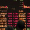 (150810) -- SHANGHAI, Aug. 10, 2015 (Xinhua) -- Investors follow stock information at a trading hall of a securities firm in Shanghai, east China, Aug. 10, 2015. The benchmark Shanghai Composite Index gained 4.92 percent on Monday to close at 3,928.42 points. The Shenzhen Component Index gained 4.31 percent to close at 13,302.96.  (Xinhua/Zhuang Yi) (mp)