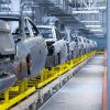 Modern automobile production line, automated production equipment. Shop for the Assembly of new modern cars. The way of Assembly of the car on the Assembly line at the plant